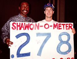 Shawon Dunston and David Cihla holding a version of the Shawon-O-Meter